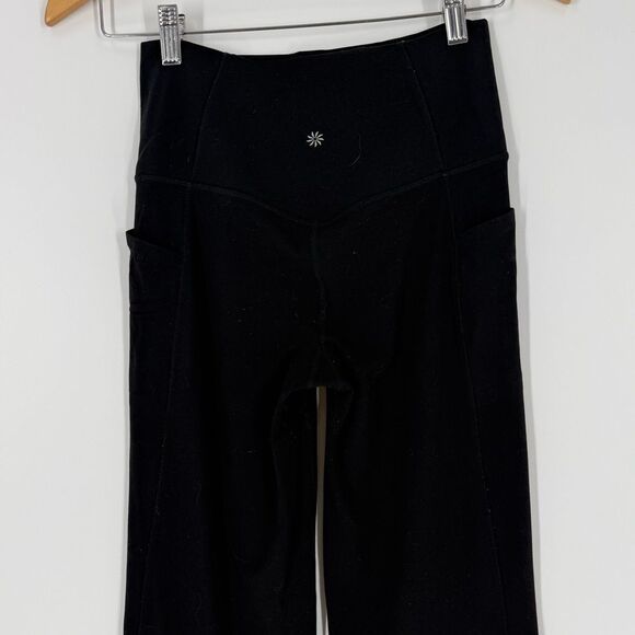 Athleta Salutation Stash High Rise Flare Pant in Black | Small - Picture 6 of 9